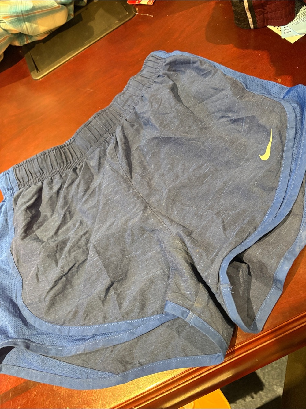 Nike Women's Dark Blue Running Shorts with Yellow Swoosh